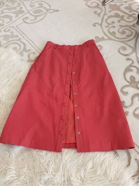 Women's A-Line Skirt in Coral Pink. 100% leather
